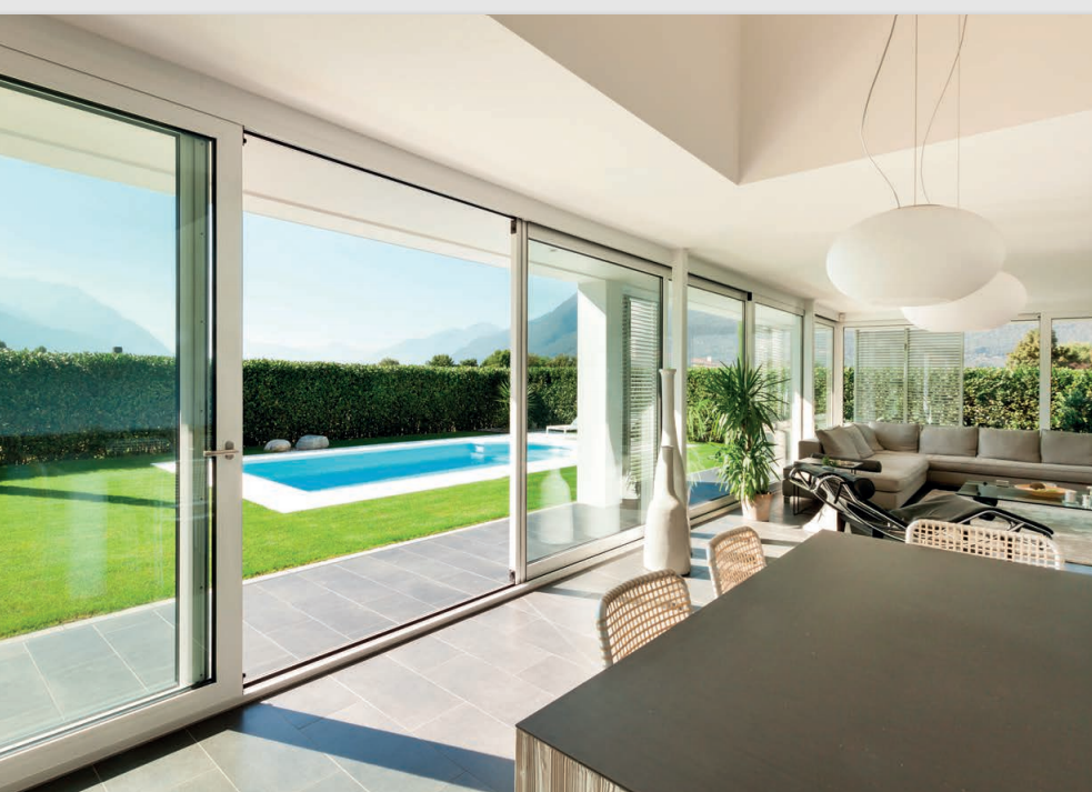 Sliding doors leading out to swimming pool